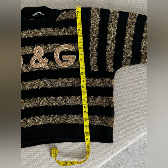 DOLCE&GABBANA
Cashmere blends
Black and gold sweater - Picture 11 of 13